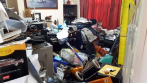 Photo of a large pile of hoarder's things